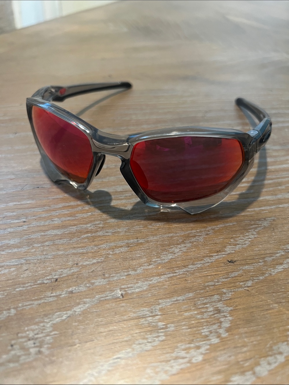 Oakley Sunglasses with Red Mirrored Lenses